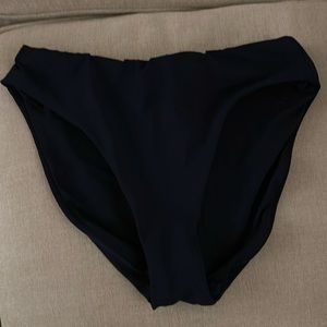 Robin Piccone navy bikini bottom. Never worn, liner still in bottom.